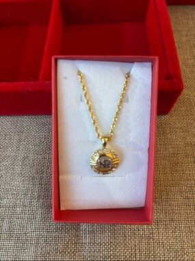 Nina Ricci Gold Tone Pendant Necklace